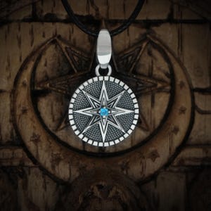 Ishtar Necklace - Star of Inanna pendant  made of 925 Sterling Silver with a Blue Cubic Zirconia