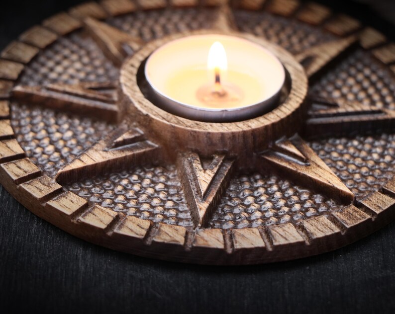 Candle holder made of wood related to Ishtar Goddess