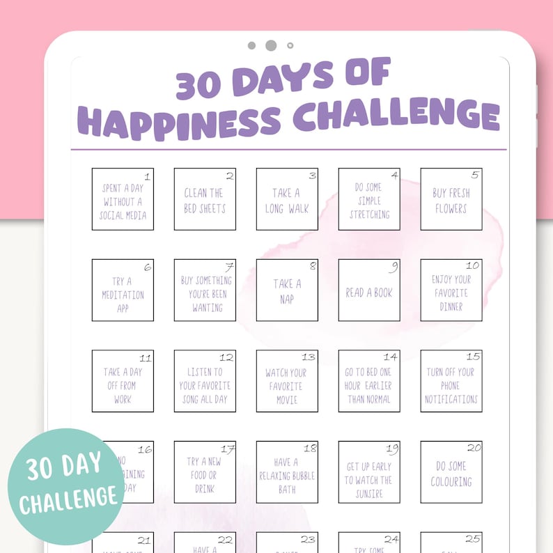 May include: A printable 30-day happiness challenge checklist with 25 daily activities to promote well-being. The checklist is organized in a grid with each activity listed in a white box with a black border. The background is a light pink watercolor wash.
