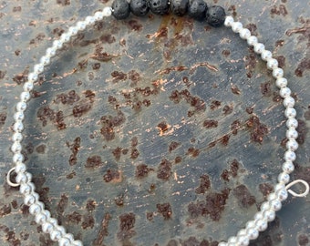 De armband van de diffuser met lavastenen