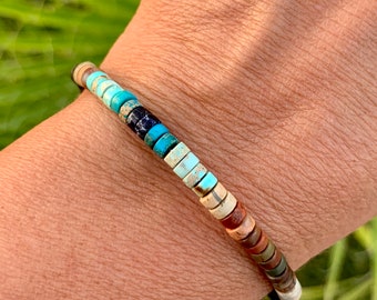 De armband van de diffuser met lavastenen en natuurlijke stenen