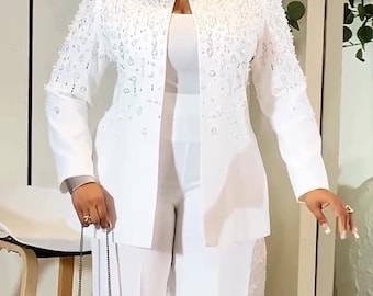 Bellissimo completo due pezzi taglie forti con stampa floreale, composto da pantalone bianco.