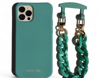 May include: A teal green phone case with a matching teal green chain strap. The case has the text "VELLY VAY" printed on the back.