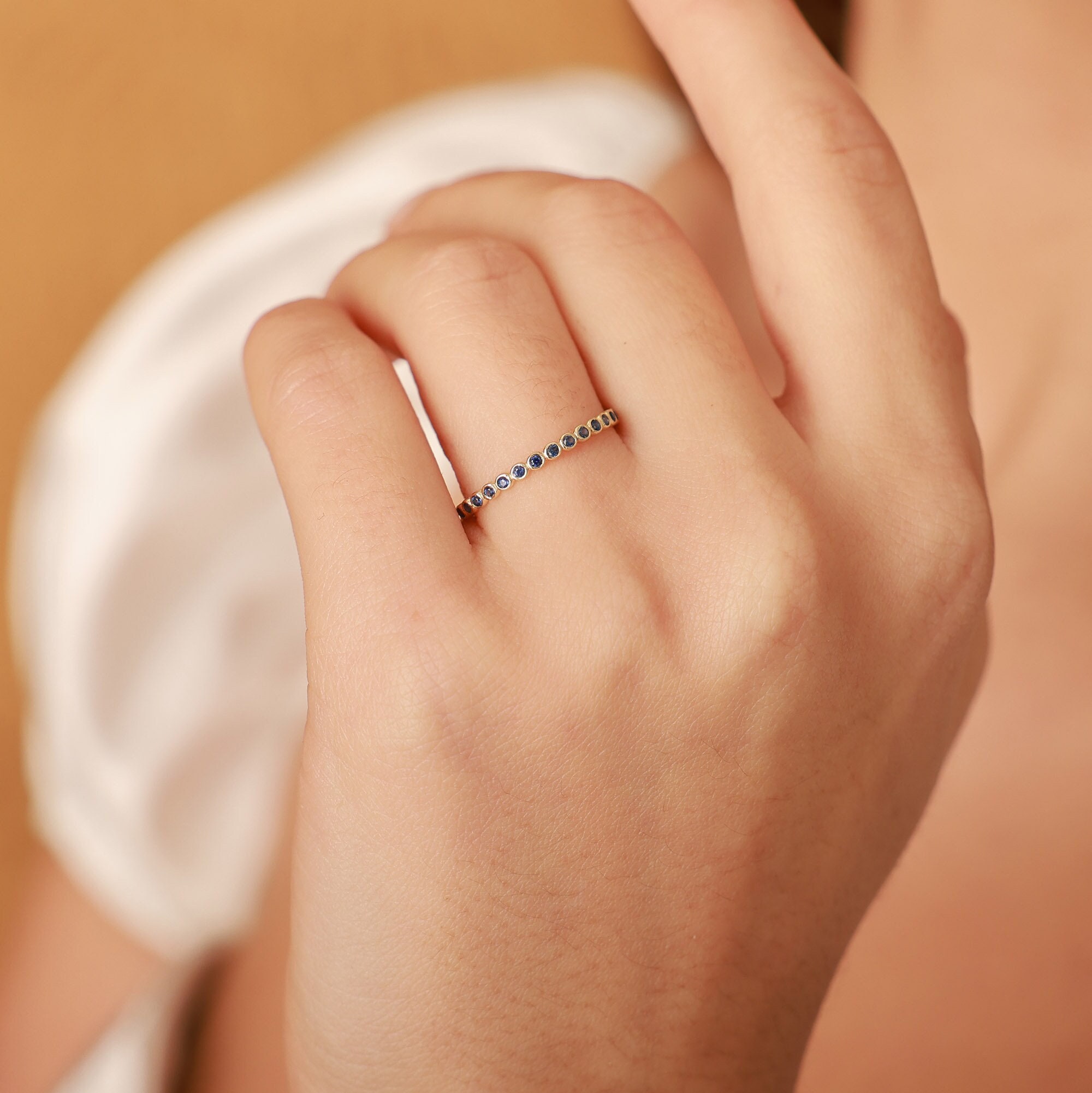 Thin sapphire hotsell eternity band