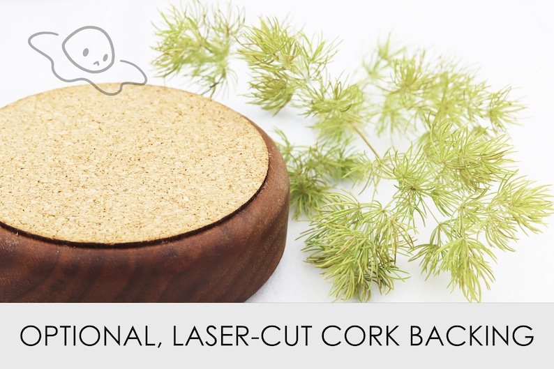May include: A round, wooden coaster with a cork backing. The coaster is brown and has a natural wood finish. The cork backing is a light brown color and has a slightly rough texture.