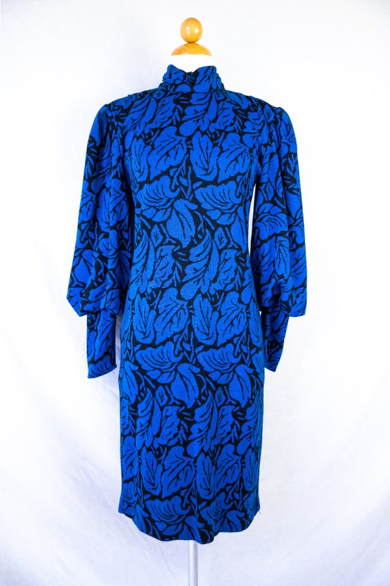 1970s - 1980s blue and black high-neck bishop slee