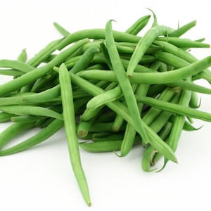 May include: A bunch of fresh green string beans on a white background.