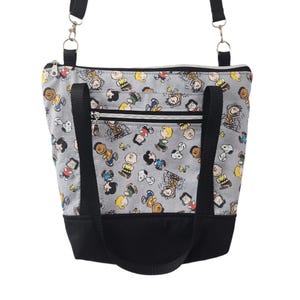 Bolso bandolera y bolso convertible con cremallera Charlie Brown