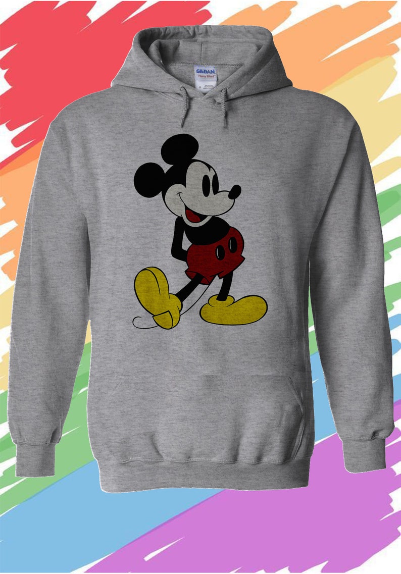 May include: A gray hooded sweatshirt with a vintage-style image of Mickey Mouse in black, red, and yellow. Mickey Mouse is smiling and has his hands on his hips.