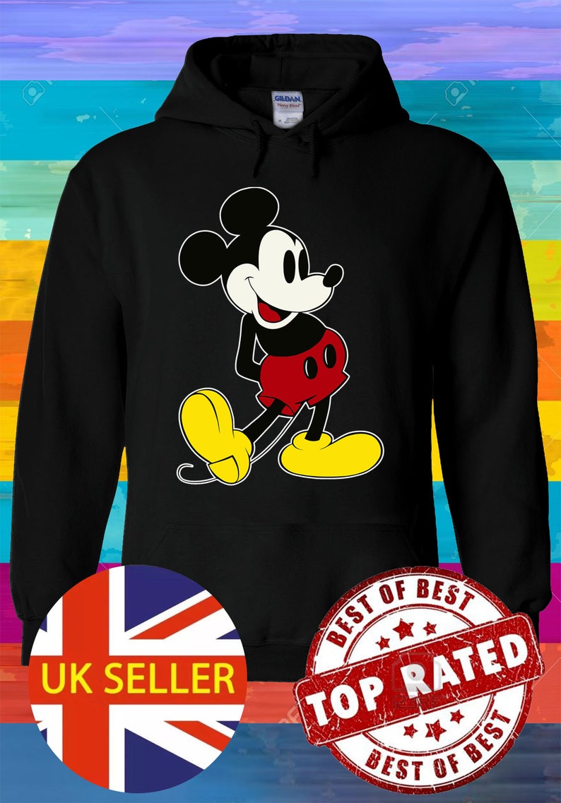 May include: Black hoodie with a cartoon image of Mickey Mouse in a red and yellow outfit. The hoodie has a large white label with the text "UK SELLER" and a red, white, and blue Union Jack flag. The hoodie also has a red circular label with the text "BEST OF BEST TOP RATED BEST OF BEST" in white.