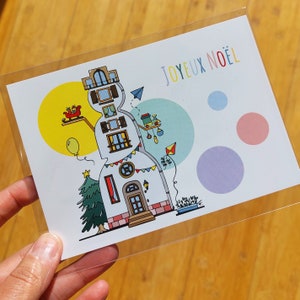 Carte postale Bonhomme de neige maison Joyeux Noël