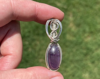 Amethyst wire wrapped pendant in Sterling Silver