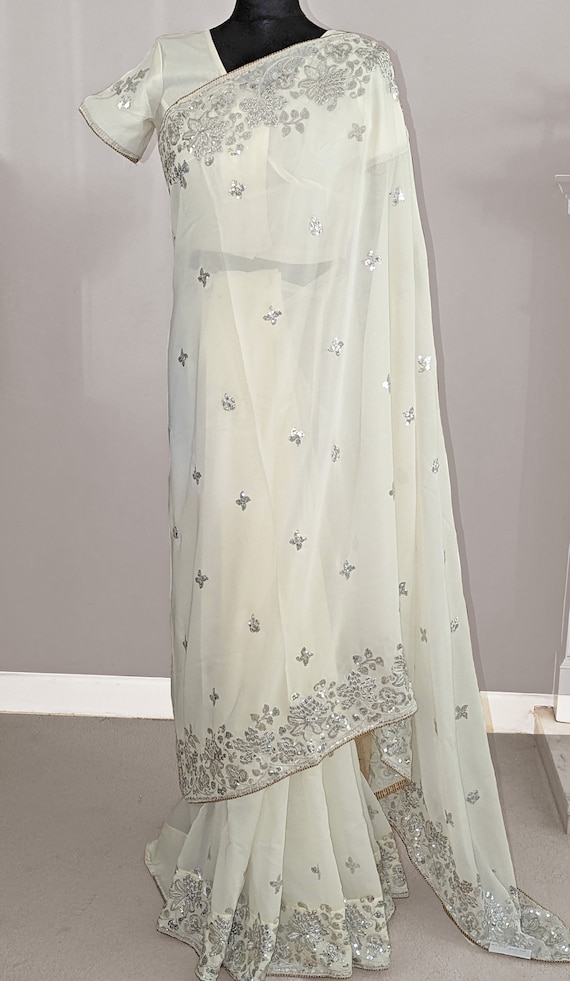 Ivory White Faux Georgette Saree: Handwork Silver Metallic Thread, Readymade Blouse