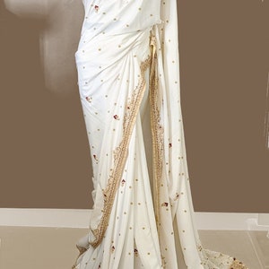 Ivory White Crepe Silk Saree: Handwork Zardozi, Motifs, Readymade Blouse