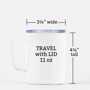 May include: White travel mug with a black lid and handle. The mug is 3 3/4 inches wide and 4 1/4 inches tall. It has the text "TRAVEL with LID 11 oz" printed on the front.