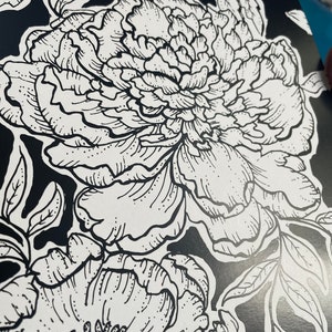 May include: Black and white line art print of a floral pattern featuring peonies. The print features intricate details of the flowers and leaves.
