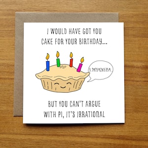 May include: A white card with a humorous birthday message. The card features a cartoon pie with candles and a speech bubble that says "3.14159265359..." The text on the card reads "I would have got you cake for your birthday... But you can't argue with pi, it's irrational."