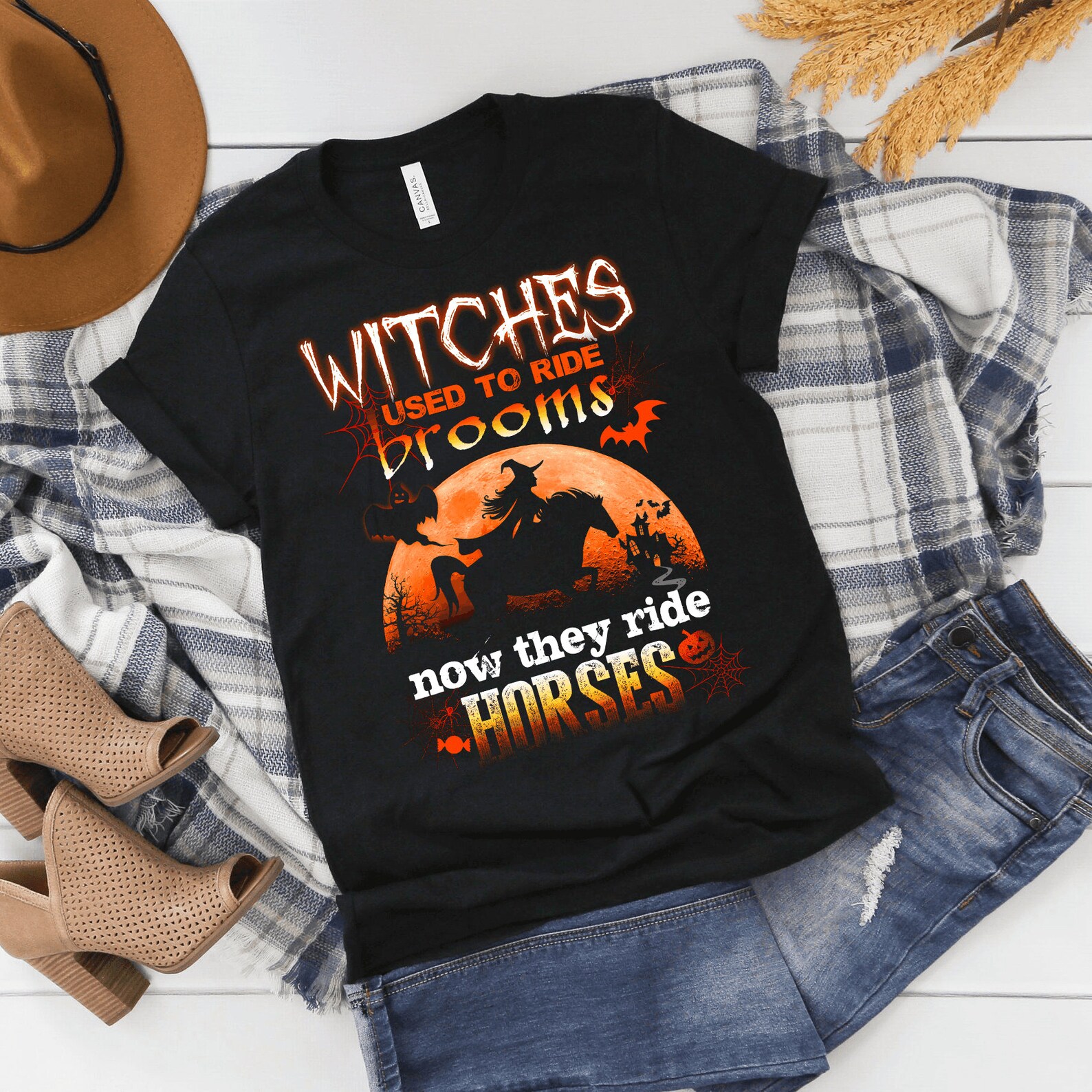 witch riding broom on black tshirt witch riding broom on black tshirt