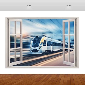 Puede incluir: Un tren blanco y amarillo pasa a toda velocidad por una ventana, creando una sensación de movimiento y velocidad. El tren está enfocado, mientras que el fondo está desenfocado, lo que aumenta la sensación dinámica de la imagen.