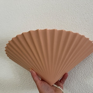 Light pink ceramic shell shaped vintage wall lamp