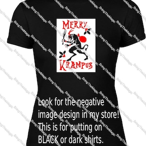 May include: Black t-shirt with a red and white graphic of a horned creature with the text "Merry Krampus". The text "Look for the negative image design in my store! This is for putting on BLACK or dark shirts." is printed below the graphic.