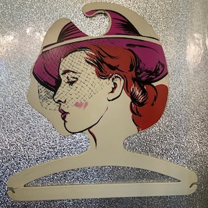 Vintage mod style clothes hanger