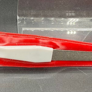 Vintage metal nail file with case