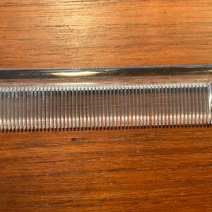 Blue translucent plastic tail comb