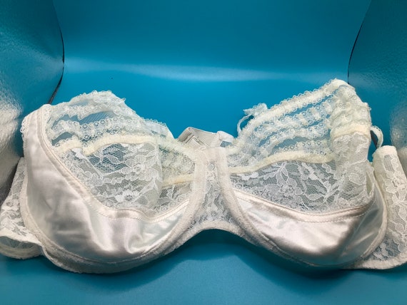 Sheer white lace and satin bra