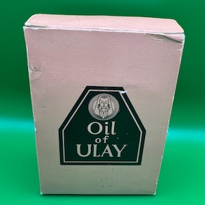 Boxed Oil of  Ulay Cream in glass bottle