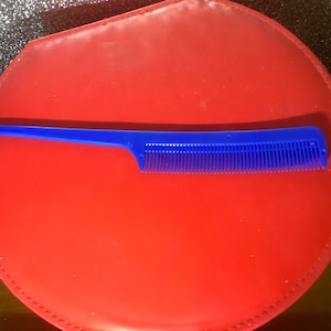 Plastic  rat tail teaser   comb