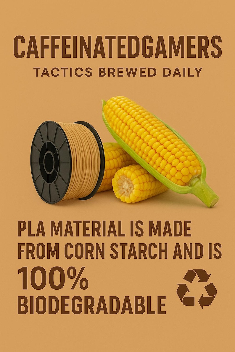 May include: A black plastic spool of light tan 3D printing filament next to two ears of yellow corn. The text reads: CAFFEINATEDGAMERS TACTICS BREWED DAILY. PLA MATERIAL IS MADE FROM CORN STARCH AND IS 100% BIODEGRADABLE with a recycling symbol.