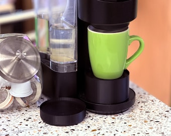 Elevador de tazas de café para Keurig: diseño modular para reducir las salpicaduras