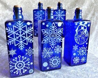 Lámpara de botella artesanal con forma de copo de nieve – Botella de whisky Haig azul marino reciclada