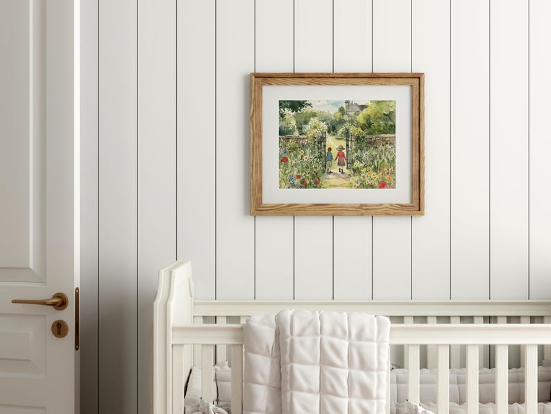 May include: A framed watercolor painting of two children walking through a garden gate. The painting is in a light wood frame and is hanging on a white wall.