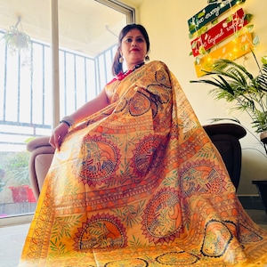 Kosh By Sanyukta Madhubani Hand Painted Mustard Yellow Saree on Desi Tussar. Perfect for Gifting and Traditional Wear