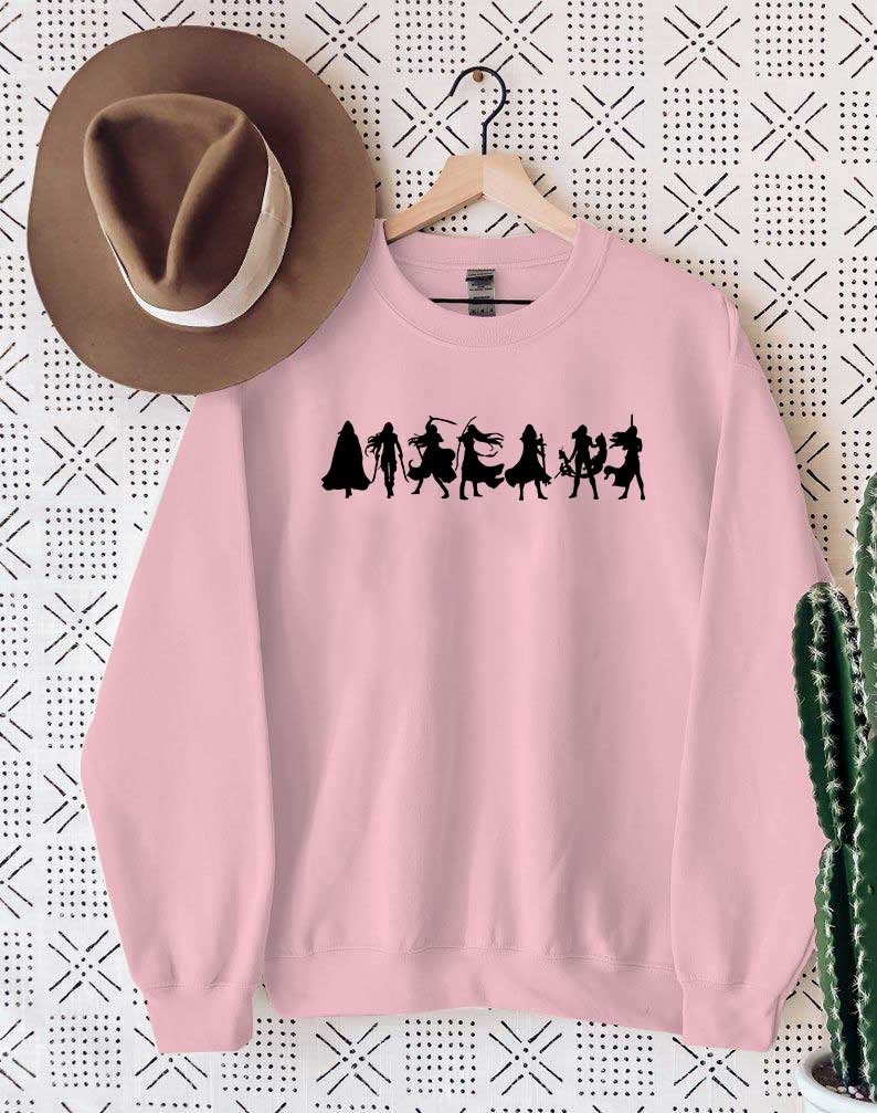 May include: A pink sweatshirt with a black silhouette of a group of women wearing capes and holding swords. The text "AMAZON" is printed below the silhouettes.
