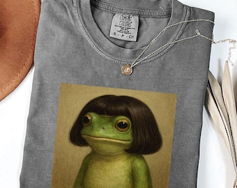 Camiseta con meme de cara de rana con corte de pelo bob