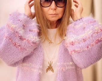 Alpaca-kasjmiervest – zacht oversized breisel met veelkleurige mouwen