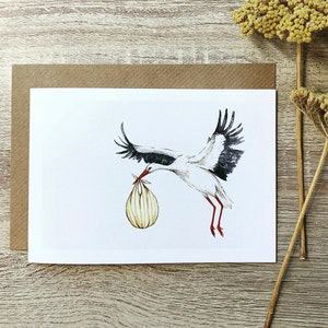 Carte cigogne et paquet jaune