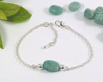 Blue Amazonite Gemstone Bracelet. Oval Shaped Semi Precious Stone with two Silver Plated Beads on a Silver Plated Chain.