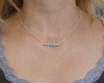 Blue Onyx Agate Gemstone Necklace. Four Round Semi Precious Gemstones and Two Silver Plated Beads on a Dainty Silver Plated Chain.