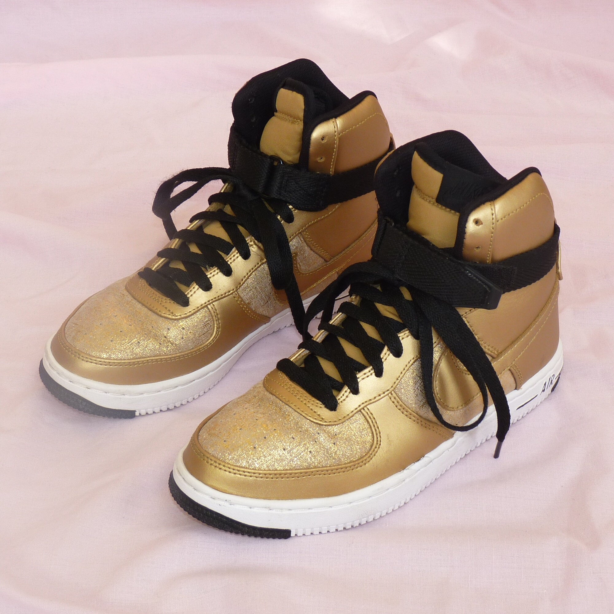 gold high top nikes