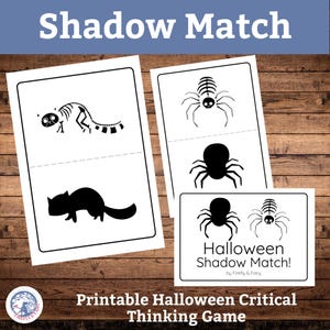 May include: A Halloween-themed shadow matching game with black and white illustrations of a skeleton, a cat, and spiders. The text "Shadow Match" and "Halloween Shadow Match!" are displayed on the cards. The game is a printable critical thinking activity.