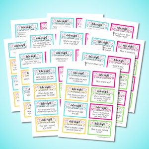 May include: A set of colourful conversation cards with a confetti design. The cards are printed with questions and prompts to spark conversation on a date night.