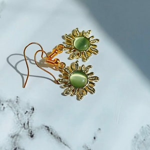 Gold plated sun earrings