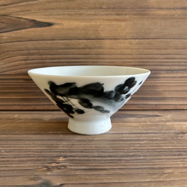 vintage Japanese rice bowl with black ink drawing blossom design