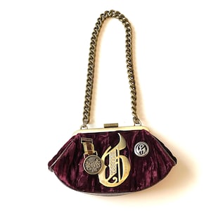 Bolso de mano vintage retro GUESS en color burdeos y bronce para mujer.