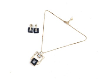 Womens SWAROVSKI black gold coloured crystal necklace with matching earrings