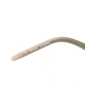 May include: Close-up of the inside of a gray eyeglass frame with the text "52  16-135 Morgan 25382662" printed on it.